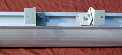 sliding bracket mount for hazardous location lighting